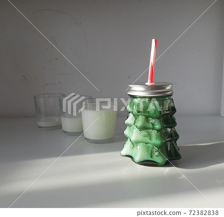 mug with christmas tree shape on white wood table 72382838