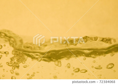 Image of liquid and bubbles (yellow) Image of liquid and bubbles (yellow) 72384068