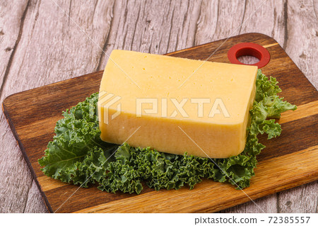 Tasty yelloow Tilsiter cheese brick 72385557