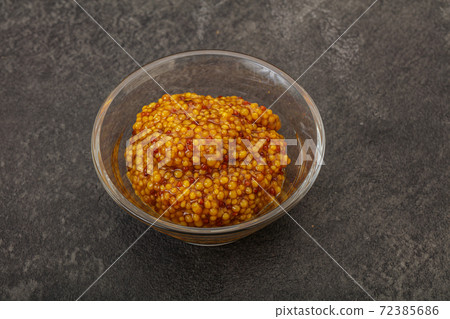 Dijon mustard sauce with seeds 72385686