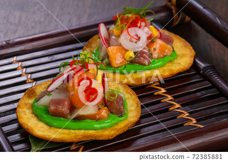 Taco with tuna and salmon Taco with tuna and salmon 72385881