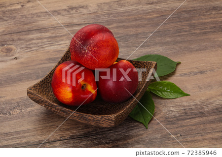Sweet tasty ripe few nectarines Sweet tasty ripe few nectarines 72385946