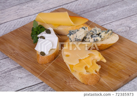 Bruschetta with various cheeses Bruschetta with various cheeses 72385973