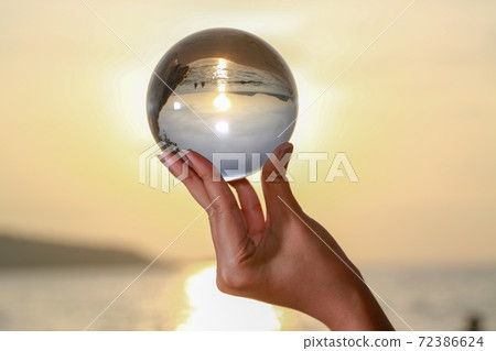 Catch the crystal ball with her finger Catch the crystal ball with her finger 72386624