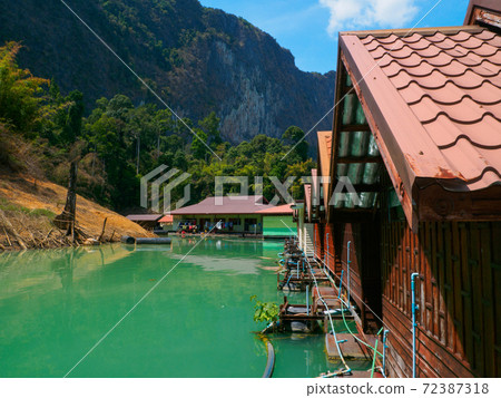 Behind the water cottage (Khao Sok Lake, Surat Thani Province, Kingdom of Thailand) Behind the water cottage (Khao Sok Lake, Surat Thani Province, Kingdom of Thailand) 72387318