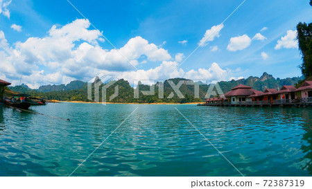 Water cottages lined up in the lake (Khao Sok Lake, Surat Thani Province, Kingdom of Thailand) 72387319