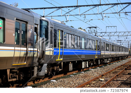 223 series special rapid A seat formation running on the JR Kyoto Line 72387974