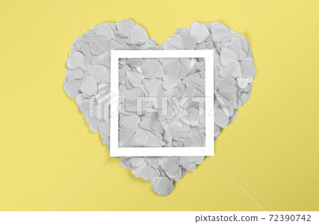 Gray heart of heart-shaped confetti with a frame. Gray heart of heart-shaped confetti with a frame. 72390742