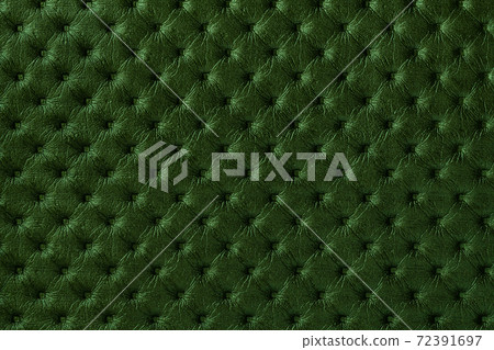 Texture of dark green leather background with capitone pattern, macro. Texture of dark green leather background with capitone pattern, macro. 72391697