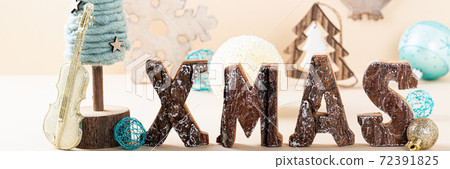 Christmas background with standing wooden letters Christmas background with standing wooden letters 72391825