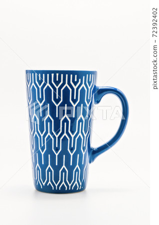one shabby blue cup isolated on a white background one shabby blue cup isolated on a white background 72392402