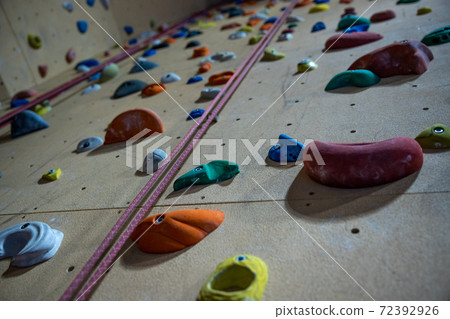 climbing wall in the gym interior in the school climbing wall in the gym interior in the school 72392926
