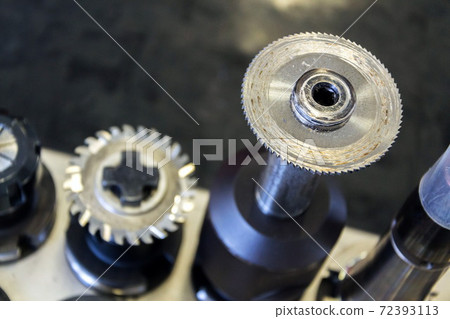 Automation and industry 4.0 concept with modern CNC milling machine cutters detail Automation and industry 4.0 concept with modern CNC milling machine cutters detail 72393113