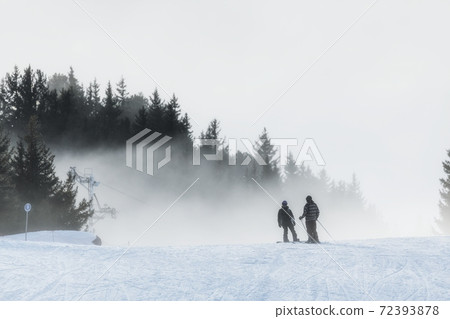 Foggy ski path with slopes Foggy ski path with slopes 72393878