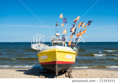 Boat or ship at moorage 72393933