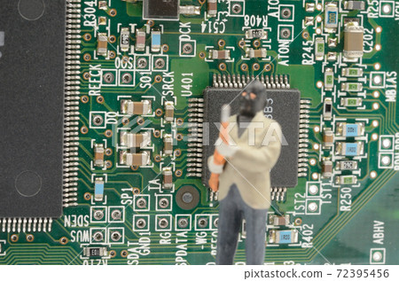 A man with a board and a gun 72395456