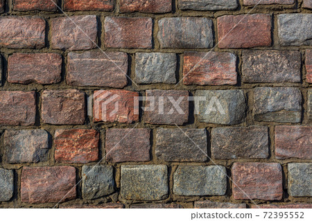 Fine masonry of short rectangular granite blocks, wall background Fine masonry of short rectangular granite blocks, wall background 72395552