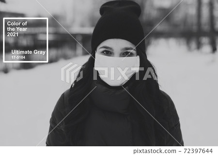 girl in a medical mask to protect against coronavirus covid-19 girl in a medical mask to protect against coronavirus covid-19 72397644