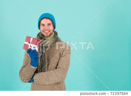 Winter is the best of the four seasons. Man hold new year Winter is the best of the four seasons. Man hold new year 72397884