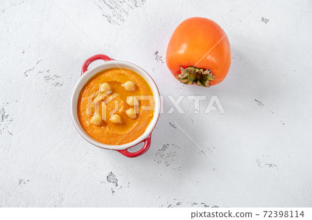 Bowl of persimmon hummus 72398114