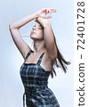 Portrait of a Teenage Girl with Long Brown Hair. 72401728