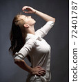 Portrait of a Teenage Girl with Long Brown Hair. 72401787