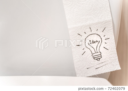 Lightbulb drawn on toilet paper, stock photo Lightbulb drawn on toilet paper, stock photo 72402079