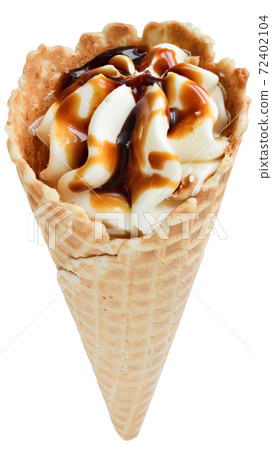 Ice cream in a waffle cone with caramel isolated Ice cream in a waffle cone with caramel isolated 72402104