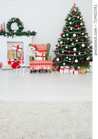 Decor interior of the house Christmas tree holiday presents new year's background Decor interior of the house Christmas tree holiday presents new year's background 72402391