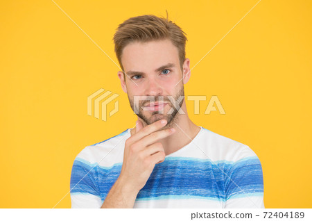 Bearded moderately. Bearded man on yellow background. 72404189