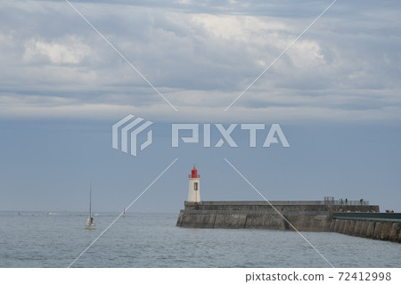 Lighthouse of grande jetee in les Sables d'Olonne in France. Lighthouse of grande jetee in les Sables d'Olonne in France. 72412998