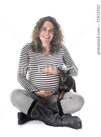 pregnant woman and pinscher pregnant woman and pinscher 72413502