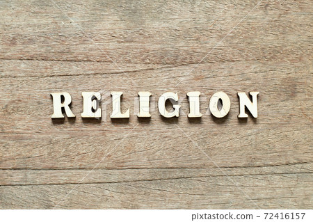 Alphabet letter block in word religion on wood background Alphabet letter block in word religion on wood background 72416157