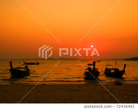 Long tail boat on the coast at dusk (West Railay Beach, Krabi Province, Kingdom of Thailand) 72416481