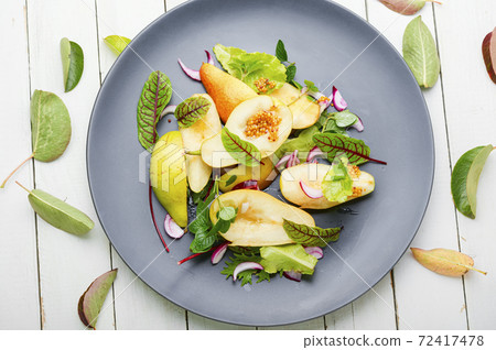 Autumn salad with pear. Autumn salad with pear. 72417478