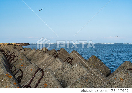 A landscape of coastal wave blocks A landscape of coastal wave blocks 72417632