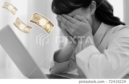 Image of a woman in trouble due to reduced money Image of a woman in trouble due to reduced money 72419229