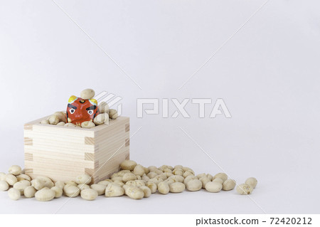 Setsubun, beans and red demons in a box on a white background Setsubun, beans and red demons in a box on a white background 72420212