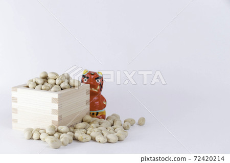 Setsubun, beans and red demons in a box on a white background Setsubun, beans and red demons in a box on a white background 72420214