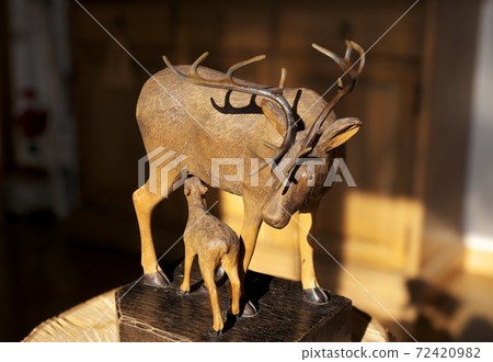 Wood carving reindeer 72420982