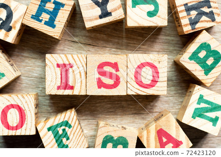 Alphabet letter block in word iso with another on wood background 72423120