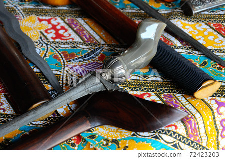 SEREMBAN, MALAYSIA -MAY 01, 2017: Keris is a traditional weapon of the Malay community in Malaysia. Made manually by using the selected iron. The handle is made of wood or ivory. 72423203