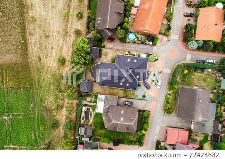 Vertical view from the air with vertical view of houses 72423682