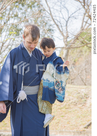 A boy wearing a kimono at Shichigosan 72424485
