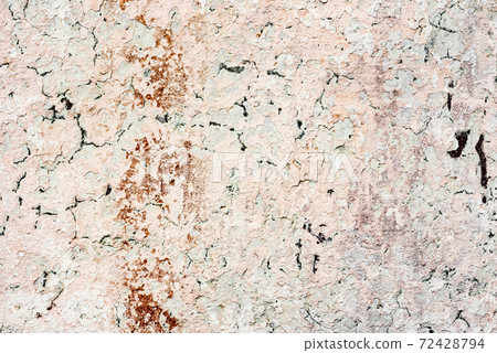 Texture of a concrete wall with cracks and scratches which can be used as a background Texture of a concrete wall with cracks and scratches which can be used as a background 72428794