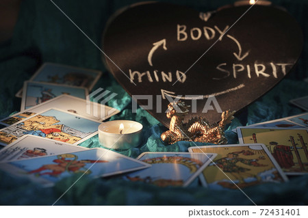 Mystical atmosphere, view of tarot card on the table, esoteric concept 72431401