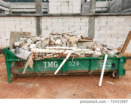 KUALA LUMPUR, MALAYSIA -MARCH 13, 2020: Huge wasted disposal bin used to collect rubbish and unused material from the construction site. Has a fixed collection schedule 72431997