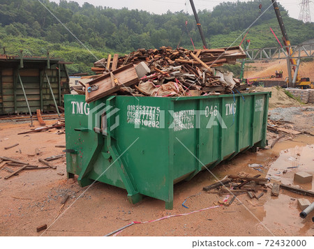 KUALA LUMPUR, MALAYSIA -MARCH 13, 2020: Huge wasted disposal bin used to collect rubbish and unused material from the construction site. Has a fixed collection schedule 72432000