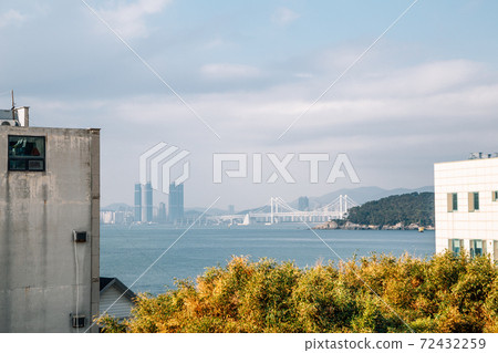 View of Gwangan bridge and blue ocean from Haeundae Dalmaji-gil Moontan Road in Busan, Korea 72432259