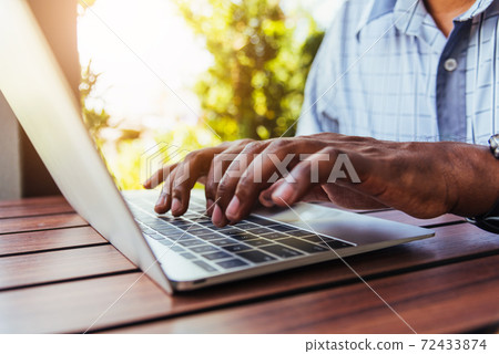 businessman work from home using laptop computer typing keyboard businessman work from home using laptop computer typing keyboard 72433874